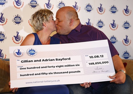 Adrian Bayford, 41, and wife Gillian, 40, from Haverhill, Suffolk, during a press conference at Down Hall Country House Hotel in Hatfield Heath, Hertfordshire, after they won ?148.6 million on Friday's EuroMillions jackpot. PRESS ASSOCIATION Photo. Picture date: Tuesday August 14, 2012. The staggering sum - of ?148,656,000 - is just behind the ?161 million landed by Colin and Chris Weir, from Largs in North Ayrshire, last July. See PA story LOTTERY EuroMillions. Photo credit should read: Sean Dempsey/PA Wire